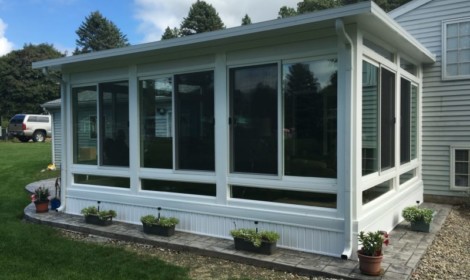 Studio Sunroom in Shelby Township with Stamped Concrete Floor